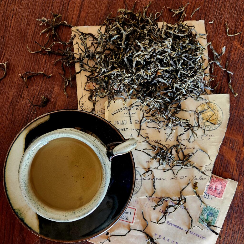 Écume du Cui Lü avec tasse